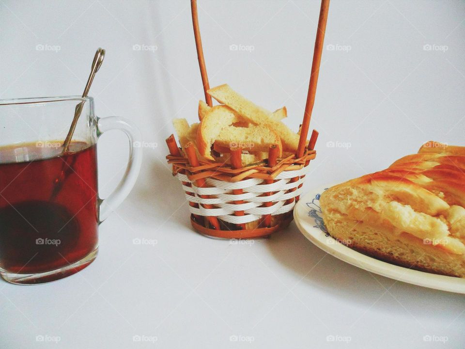 Close-up of tea with bread at morning