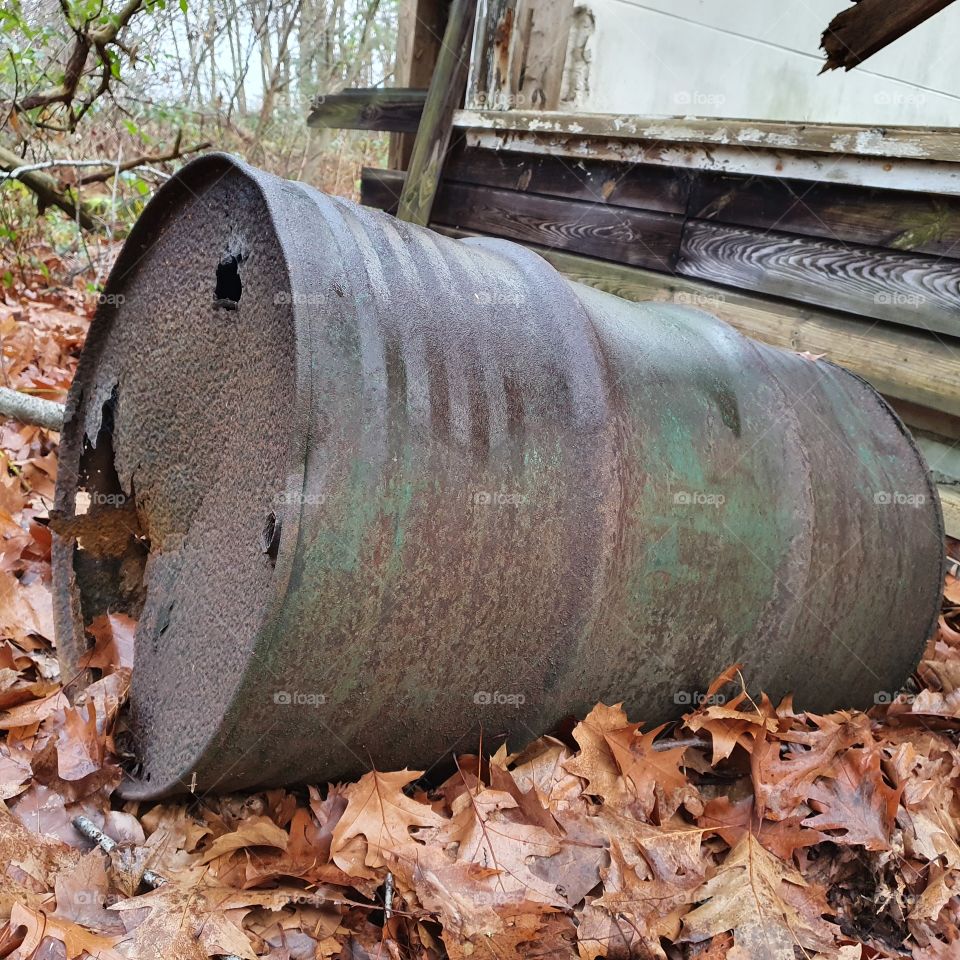 broken barrel in the forest