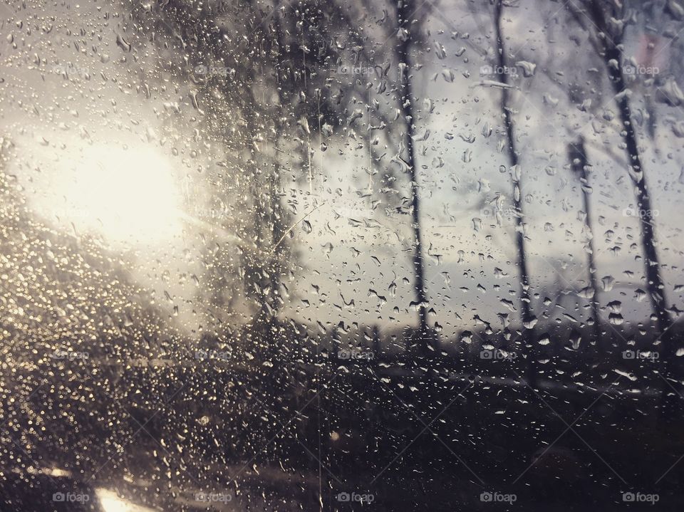 Sun after rain while driving a car