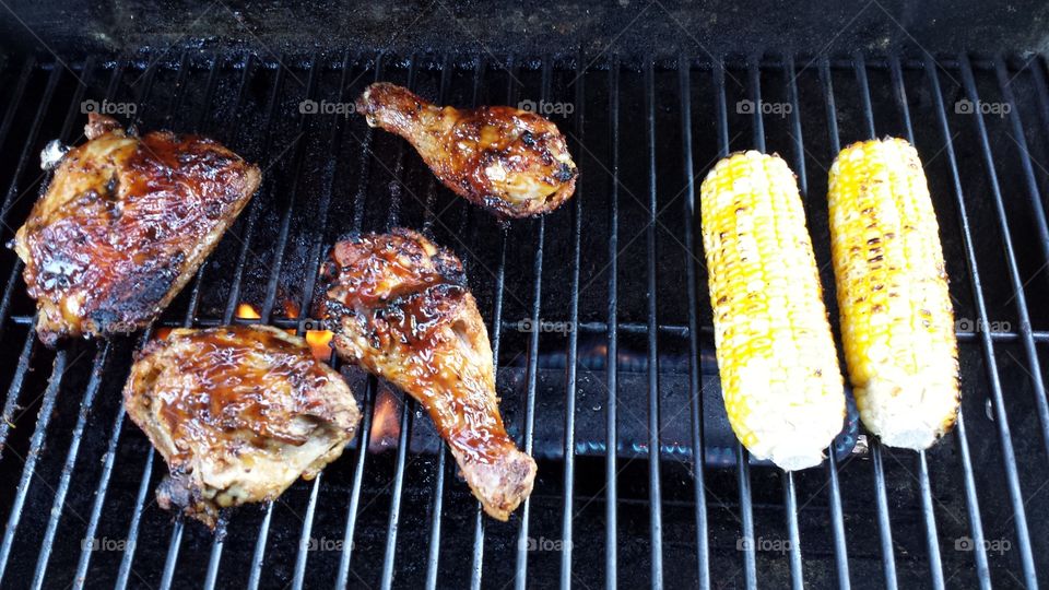 Grilling. Chicken and corn