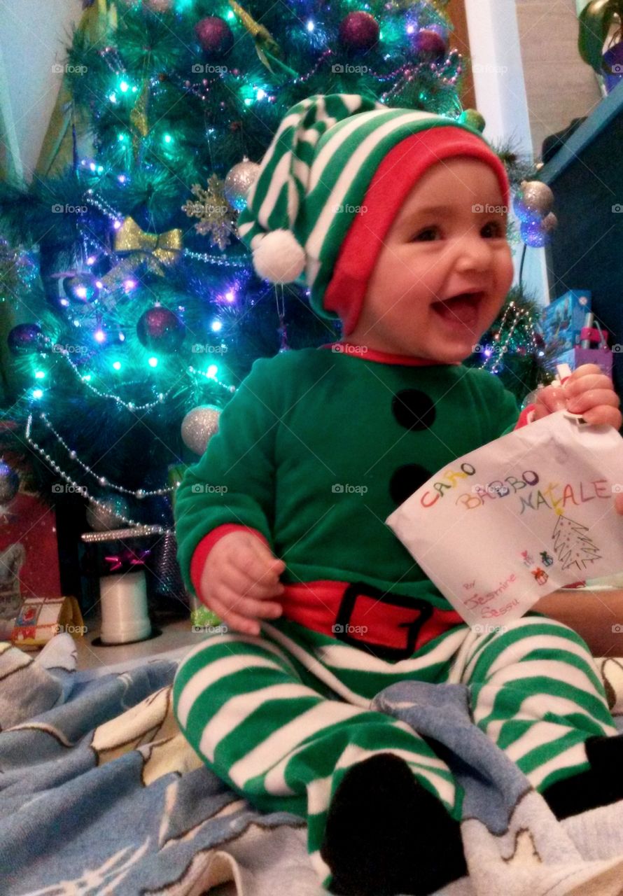 baby elf with christmas gift letter