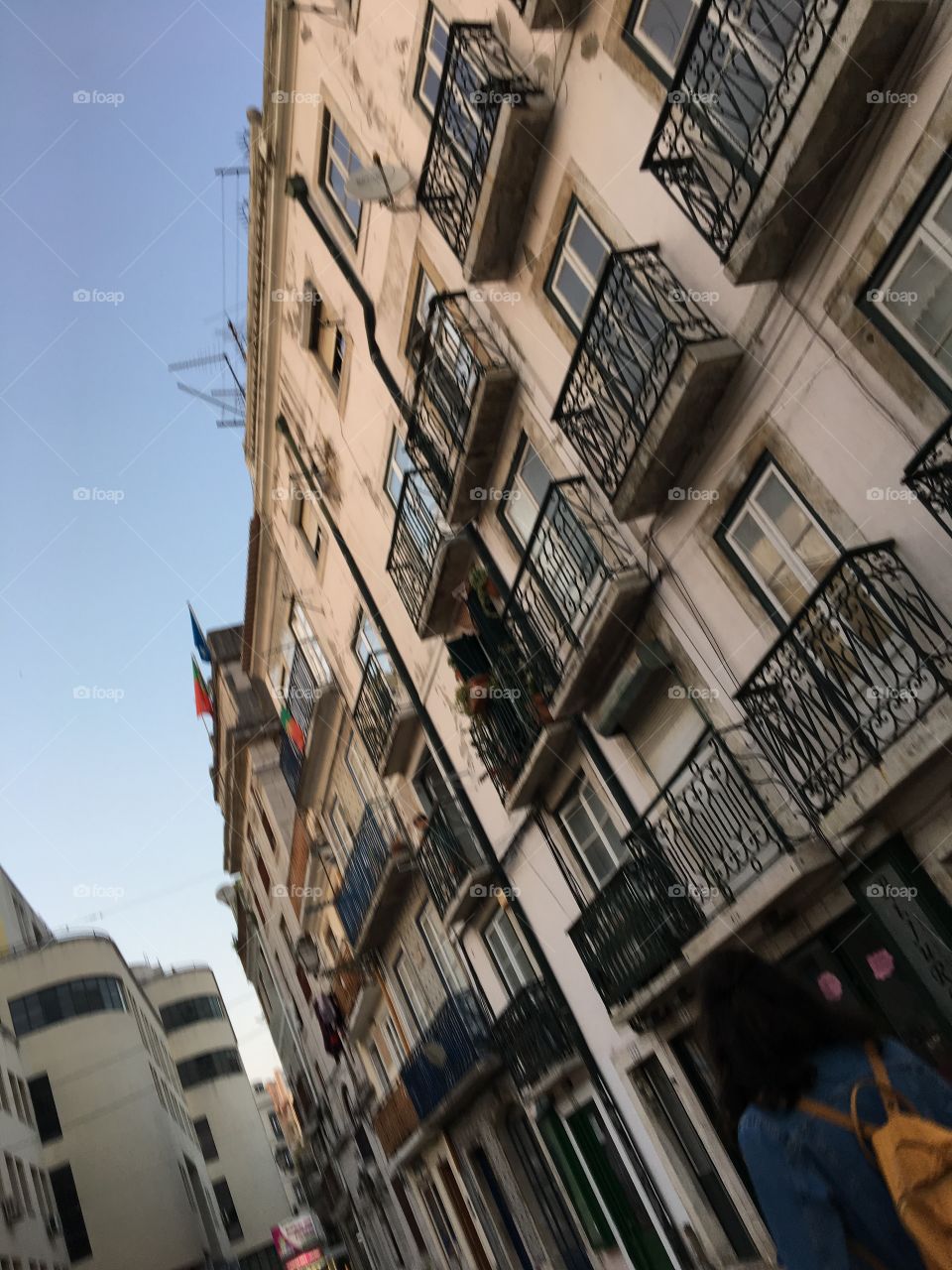 Black balconies on a fasad of a building in Lisbon 