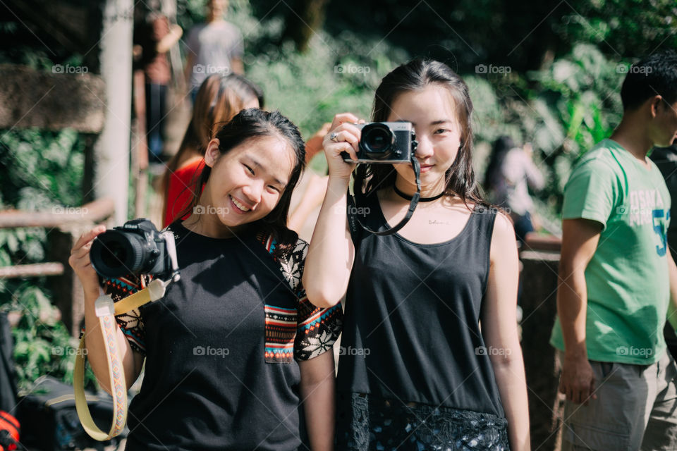 Asian girl with camera 