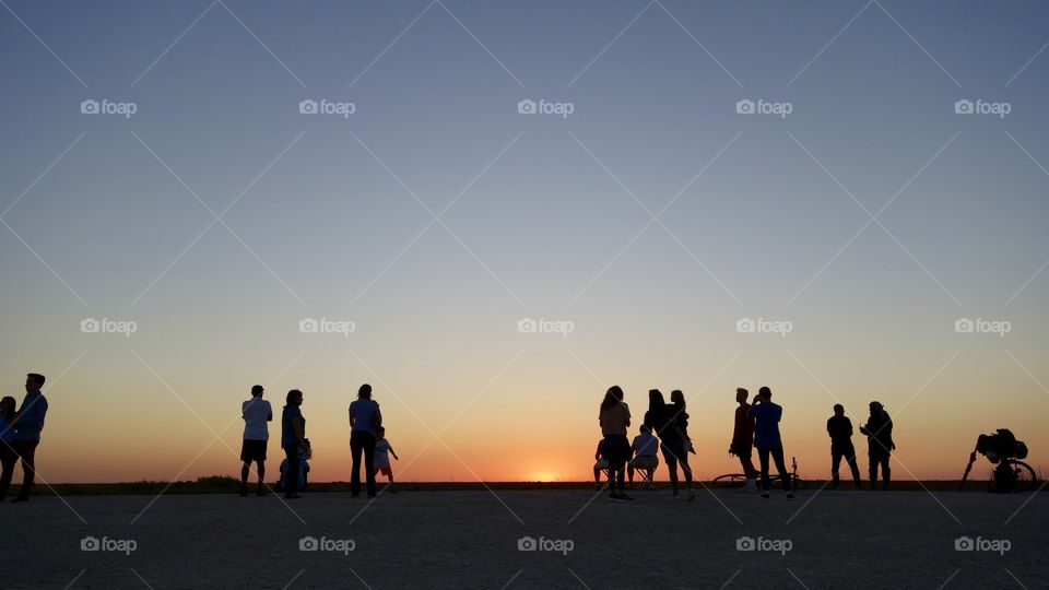 People Gathering For The Sunset