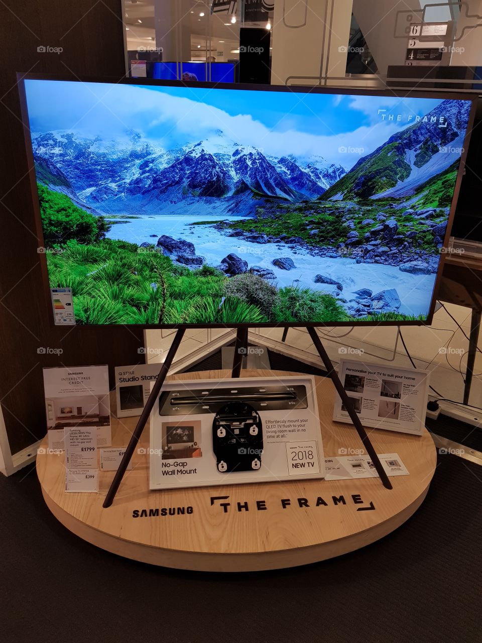Samsung The Frame art mode 4K UHD TV installation at Peter Jones Sloane square Chelsea King's road London displaying customizable copper bezel and studio stand