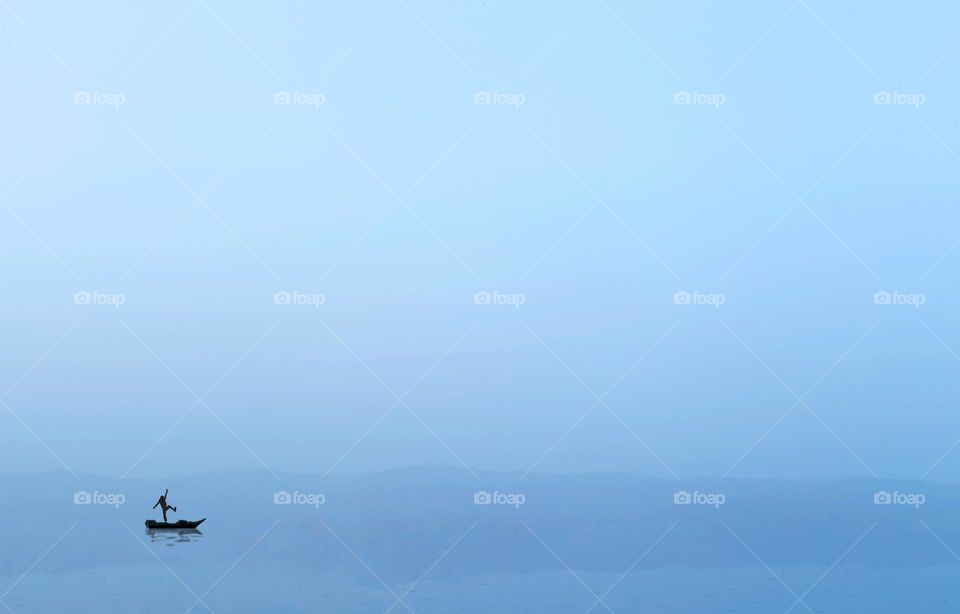 A man alone in the sea