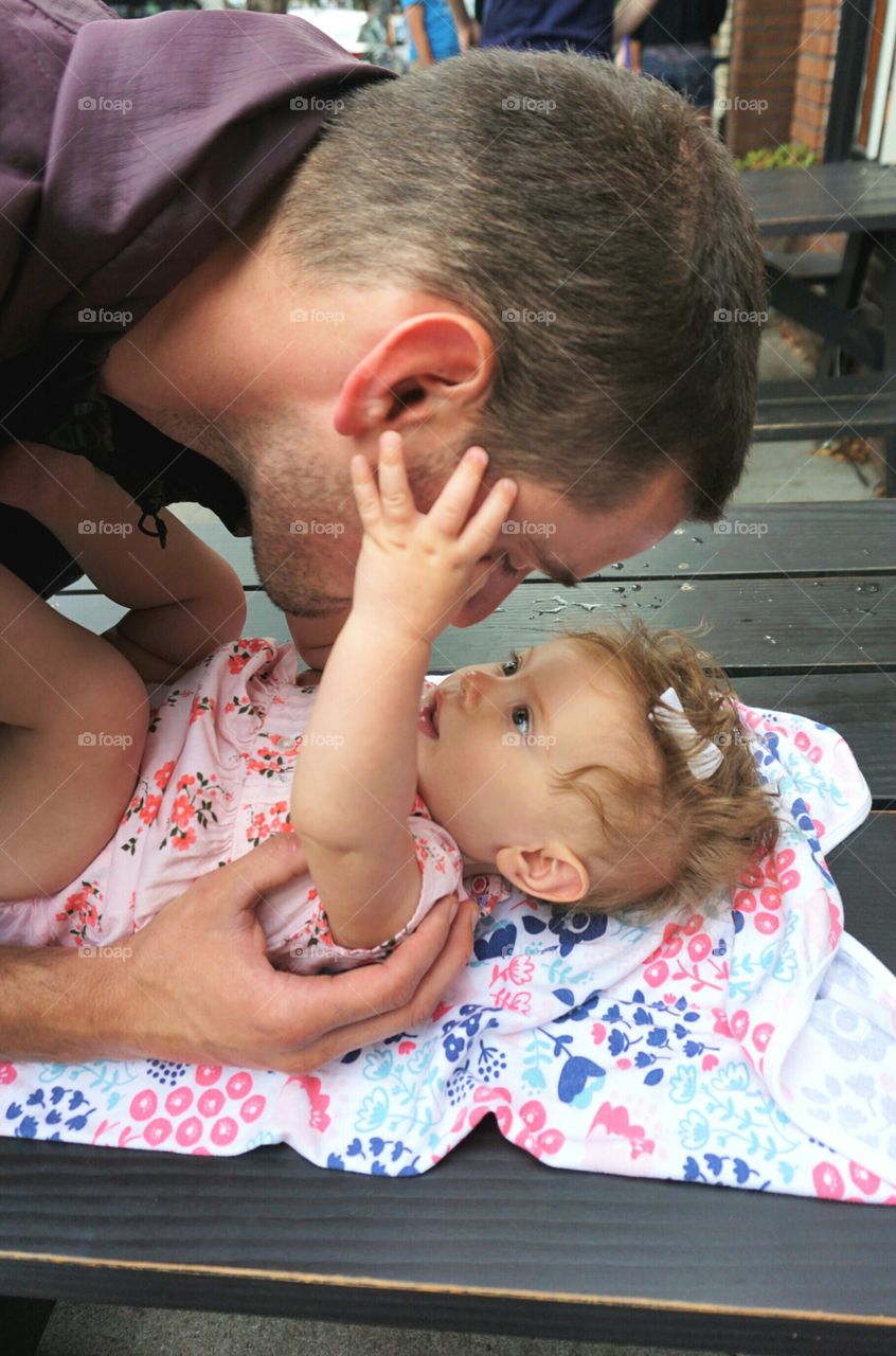 Father playing with daughter