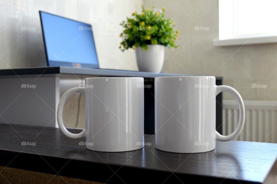 Two white ceramic cups for applying images and photos