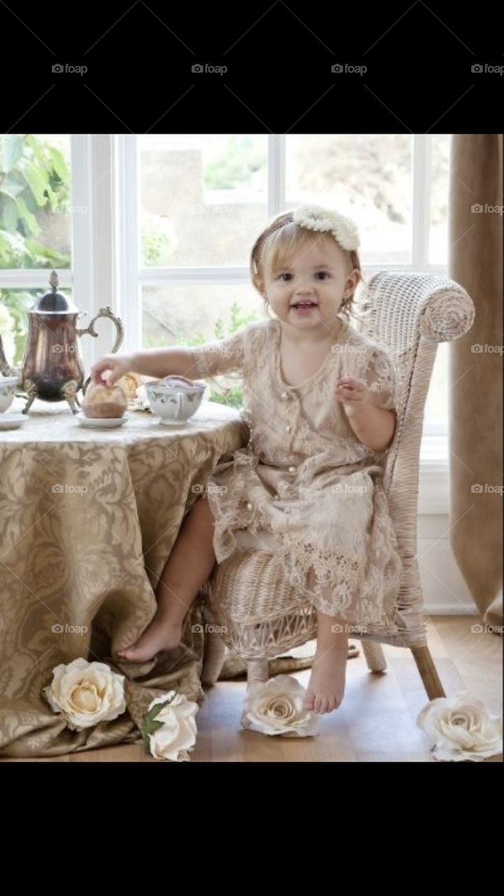 Little Girl having a Tea Party