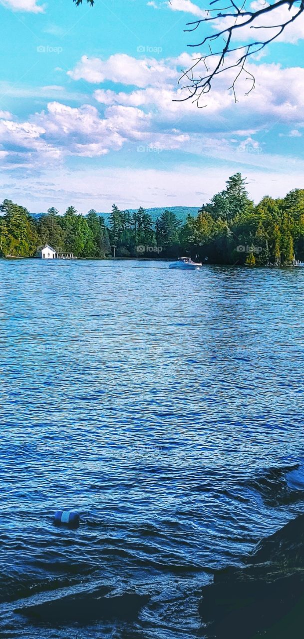 A motor boat passing the Boathouse!