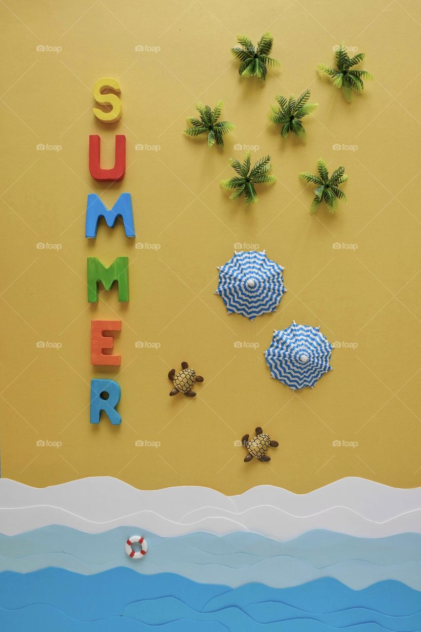 Directly above view of creative summer mood board. 