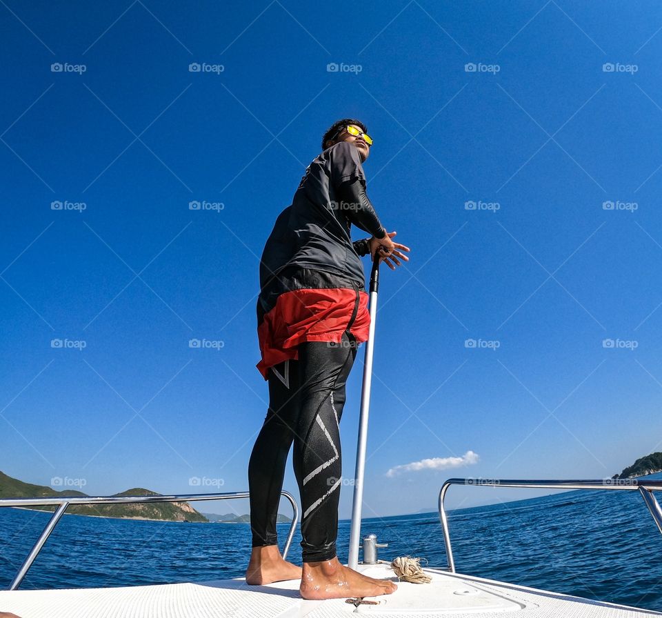 Sattahip,Chon Buri/Thailand-November 24 2019:Guide man of diving trip at Samae San island is standing in front of the ship