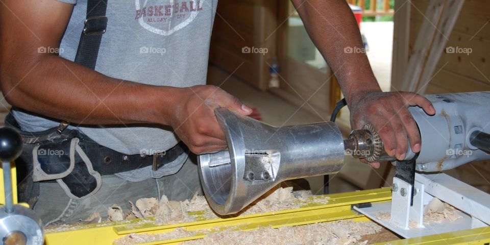 Carpenter working in workshop