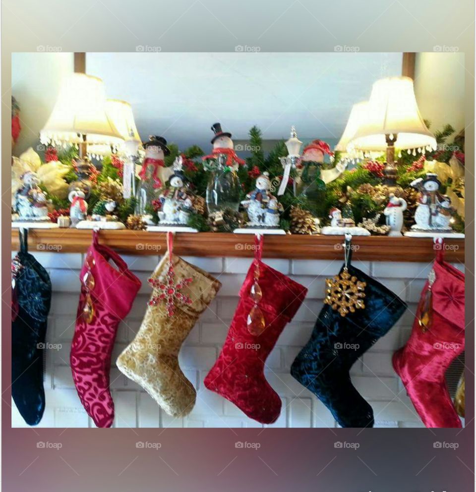Stockings hanging at the fireplace