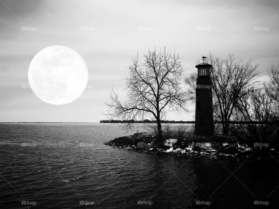 asylum point lighthouse with full moon in black and white Oshkosh Wisconsin