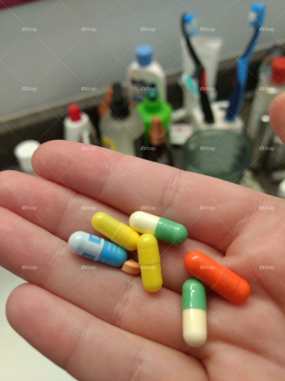 A handful of colourful capsules -- treatment can be beautiful
