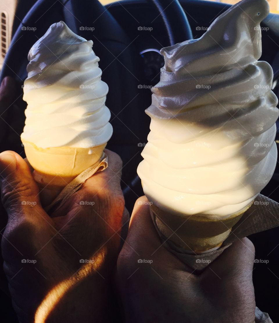 Two soft vanilla ice cream cones. Both mine! 