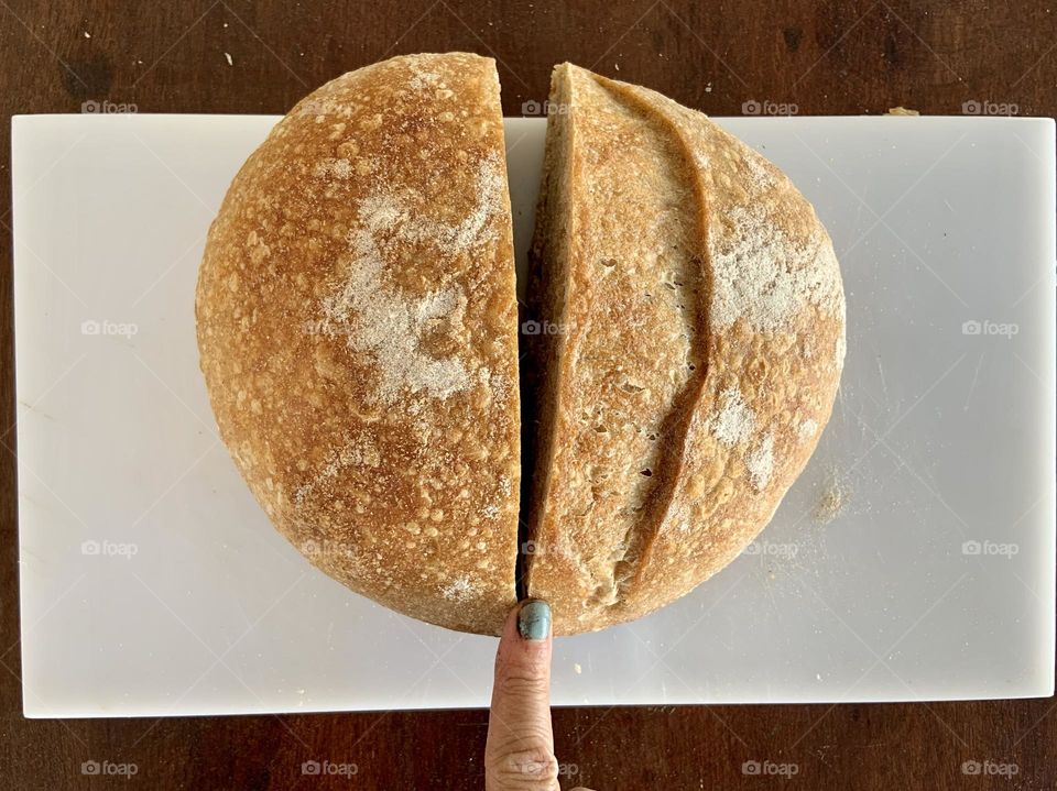 Cutting circle homemade bread 
