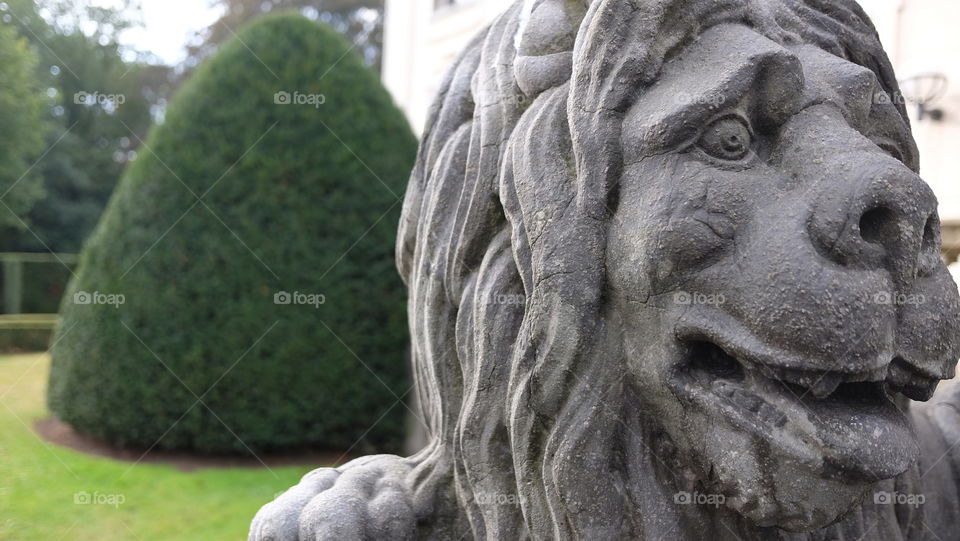 An old sculpture in park in Antwerp