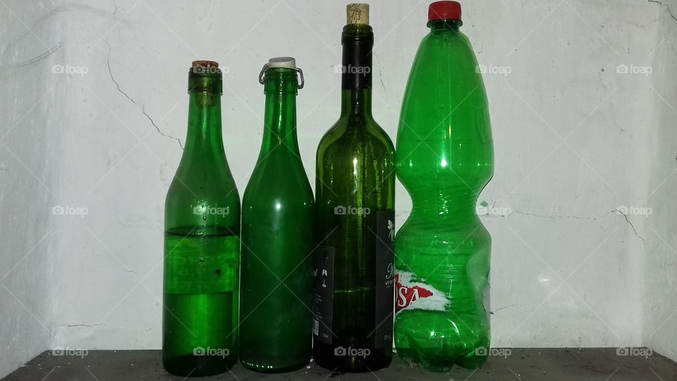 green bottles empty half-empty old drink water wine oil