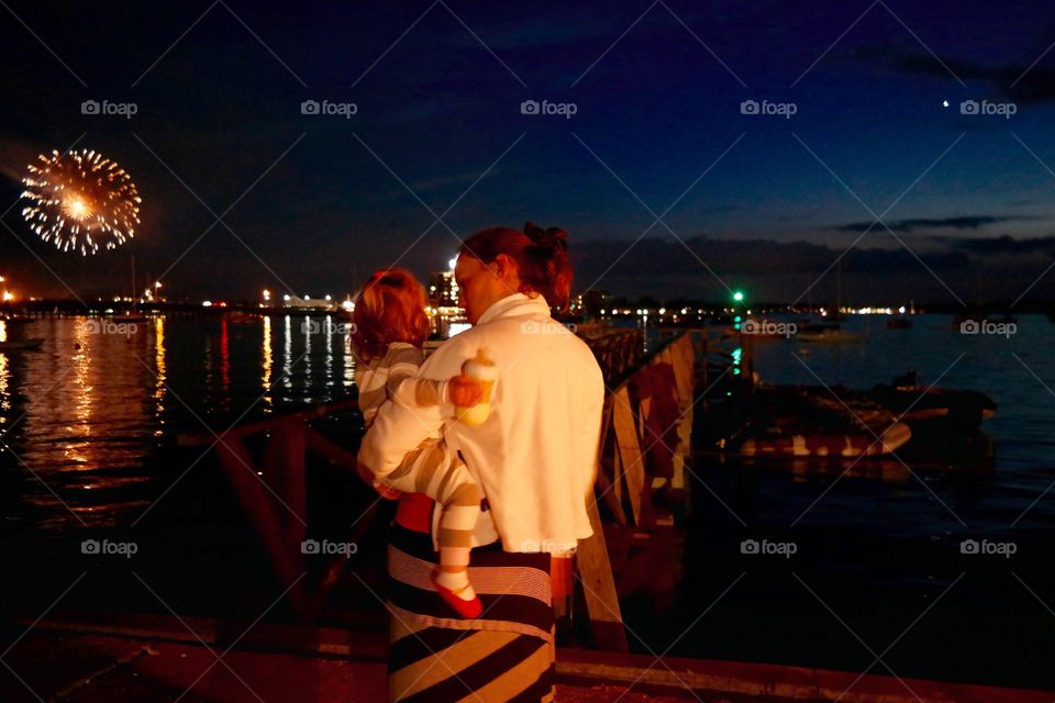 Mom and baby watching firework. Took this during the fireworks show.