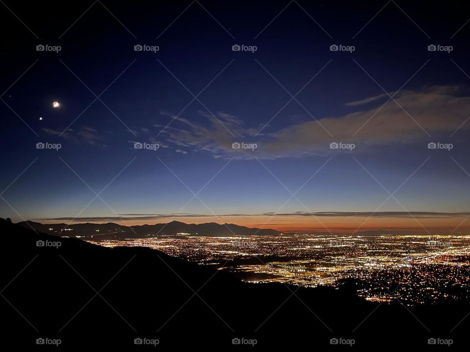 A chilly evening sunset/moonrise combo as solstice sets in for the summer in Utah 