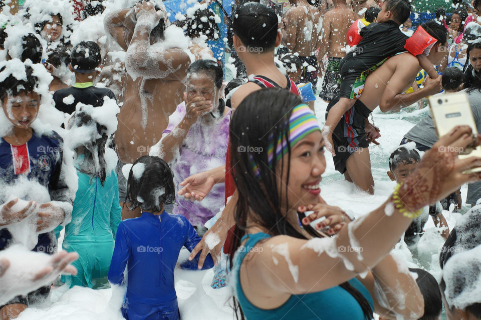 Every Sunday morning people gather at the Sidoarjo city water park to take a bubble bath together,,East Java 2018