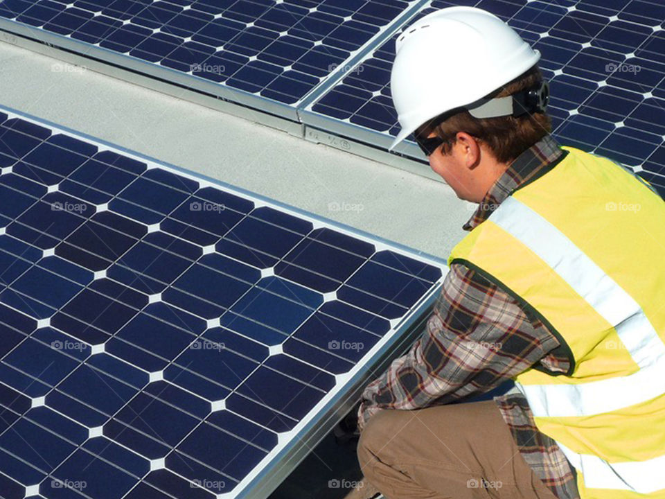 Solar panel install with technician