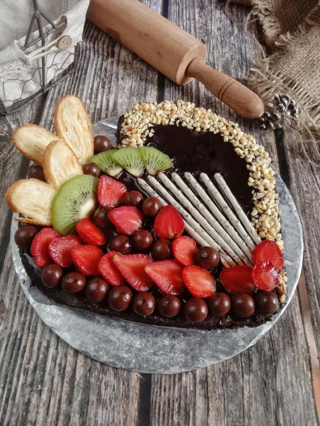 Chocolate birthday cakes with various toppings are often a favorite of many people.