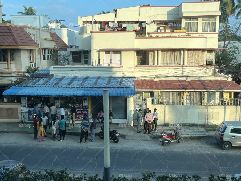 People enjoy a late evening snack and tea