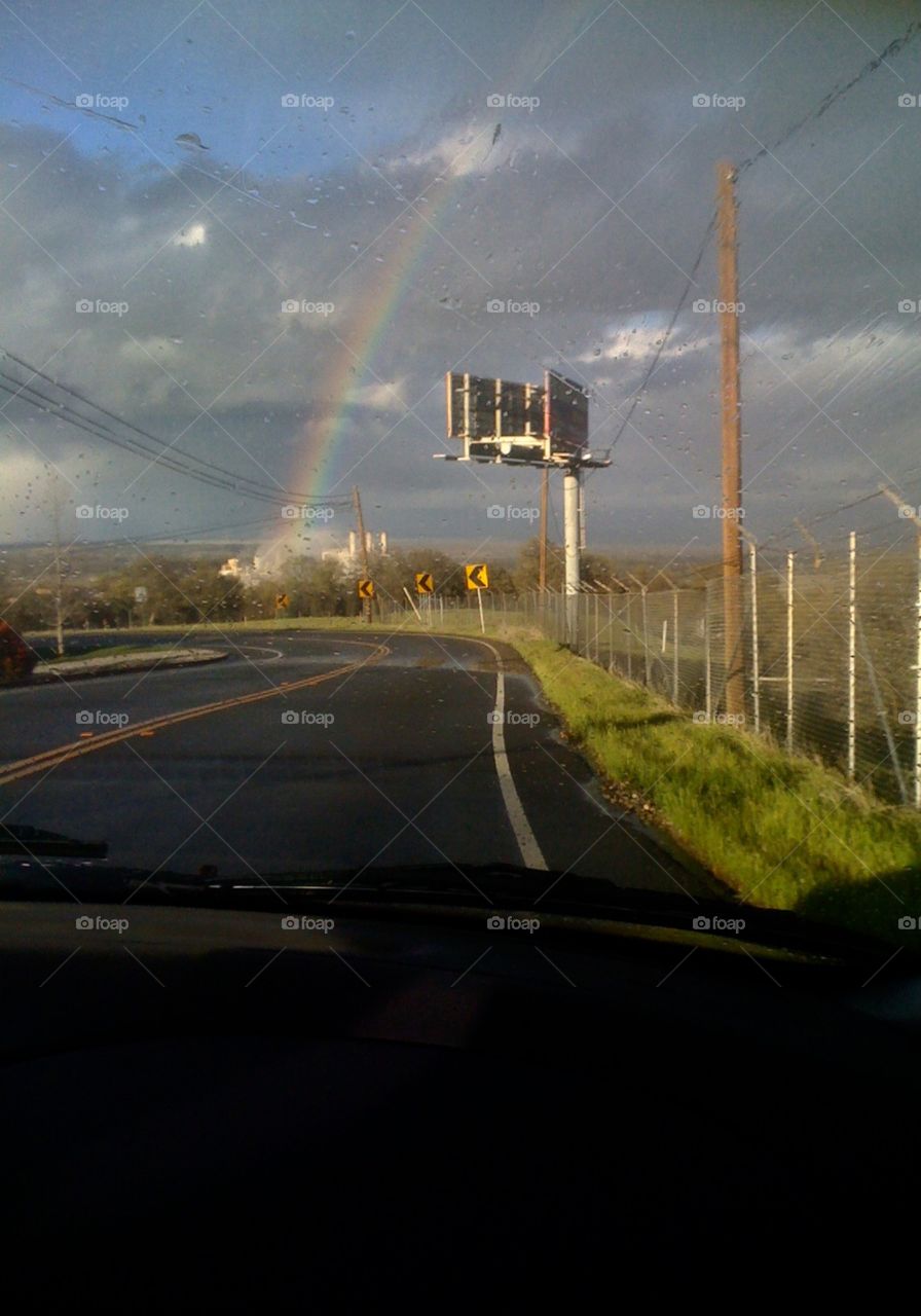 Rainbow from a winding road