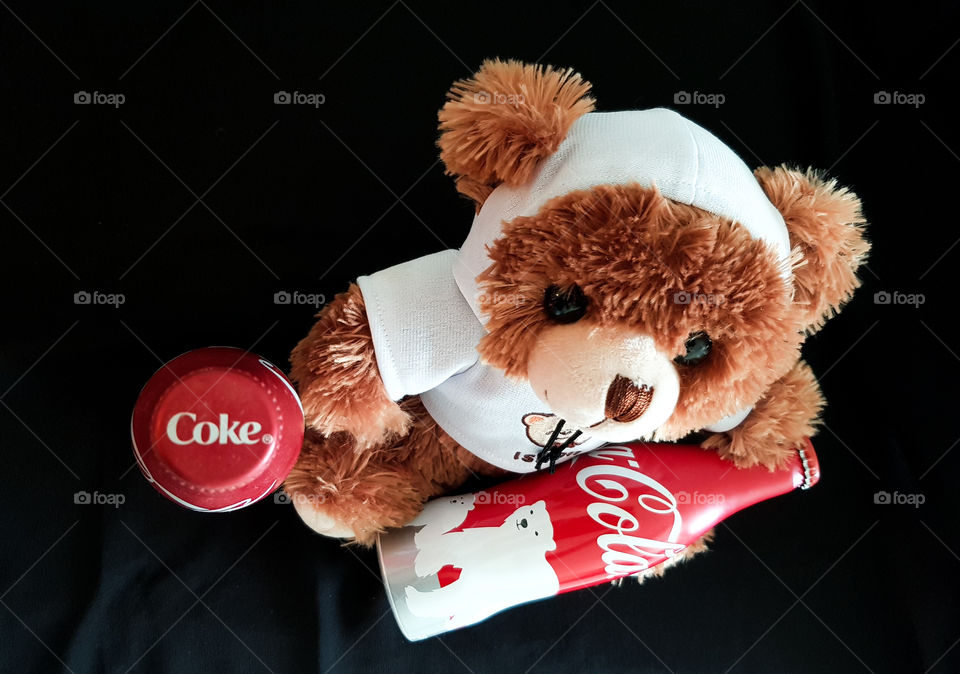 Bobo and his favourite bottle of coca cola. It is adorable and always keep me smiling!