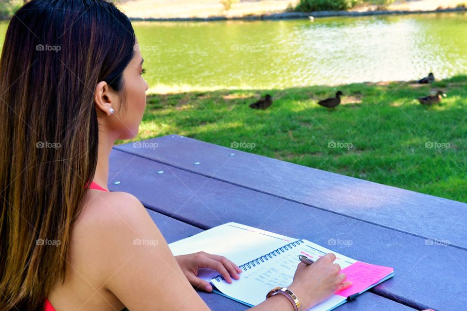 Writing notes in the park