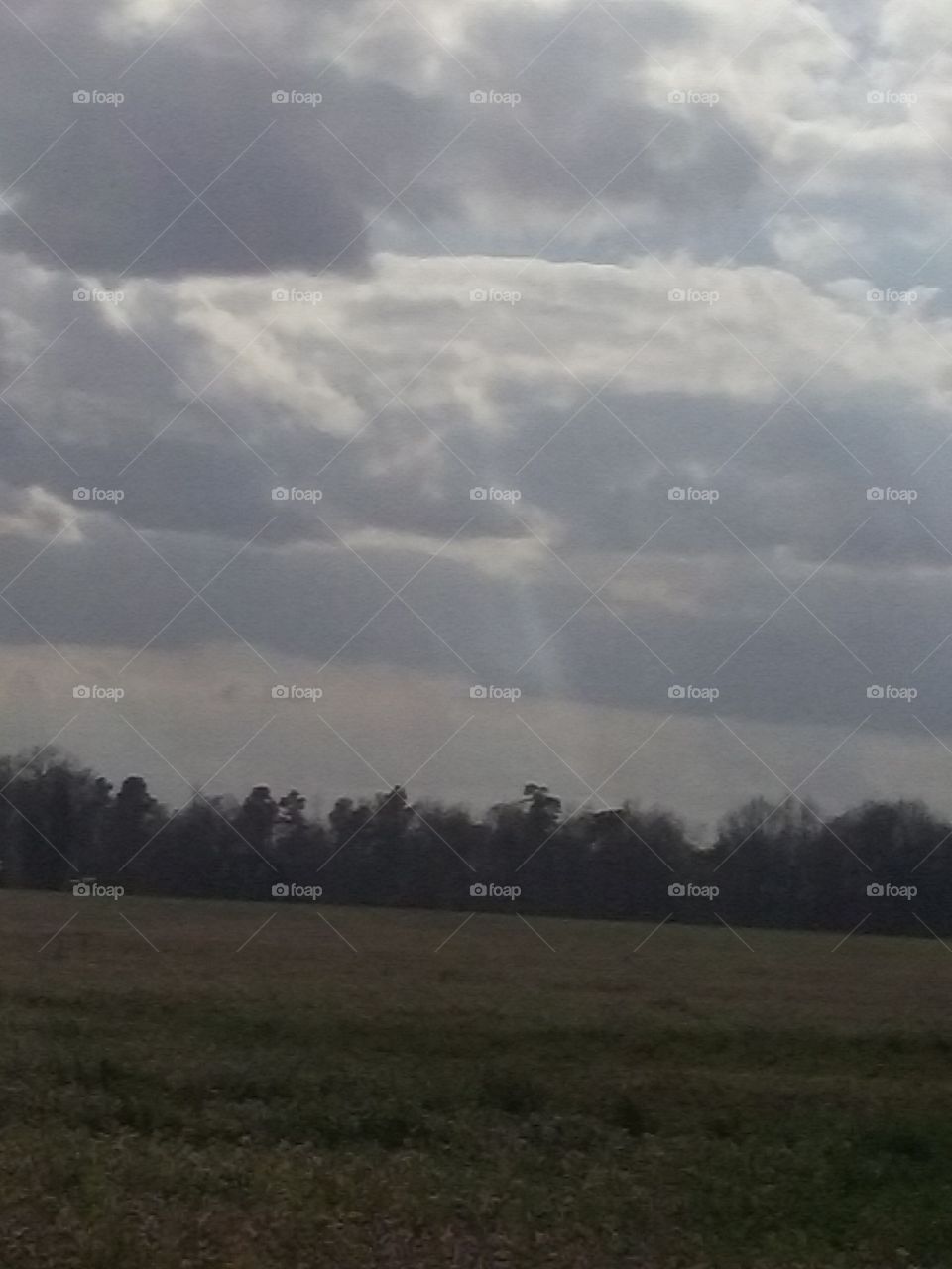 beams of light through the clouds