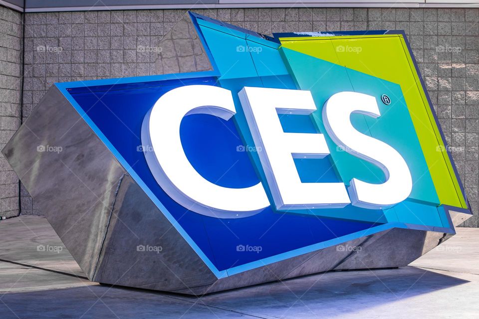 Las Vegas, NV 1-6-2023: Large logo of CES outside the entrance of LV Convention Center. Held annually, CES is the largest consumer electronics convention in the world. Vibrant cool colors on the sign.