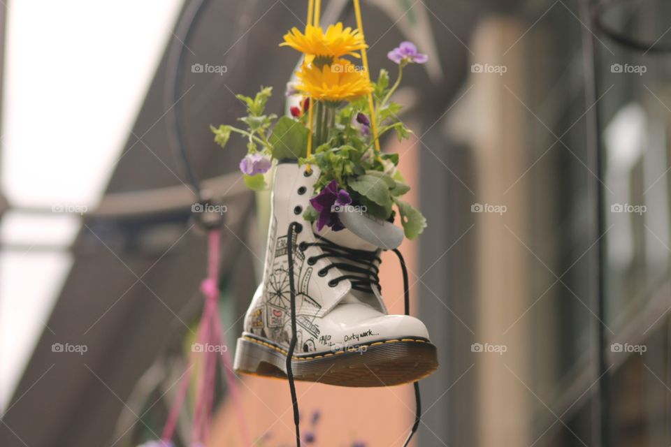 These boots are not made for walking!. Boots recycled as plant pot 