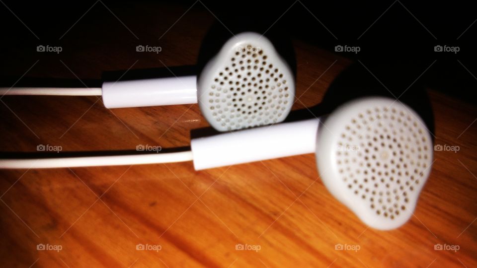 earphone  on wooden table