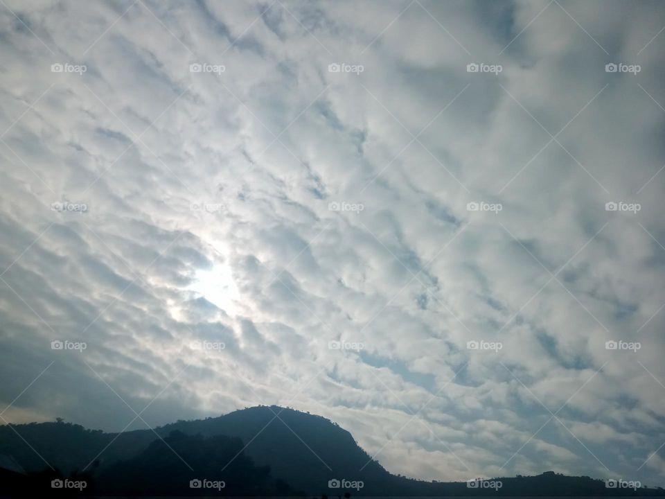 Ravarma VanguvO 
Happy morning 
HalfWight clouds 
The setting sun
Luminous clouds