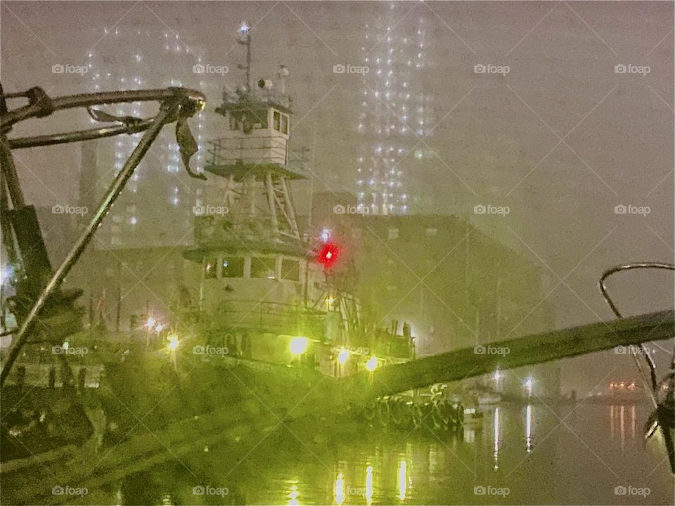 At night the boats that pass us by on the “East River” at “Newtown Creek” in “Long Island City”, Queens can paint intense and beautiful motifs when their illumination pierces through the fog. 2023. Hypnotic Productions