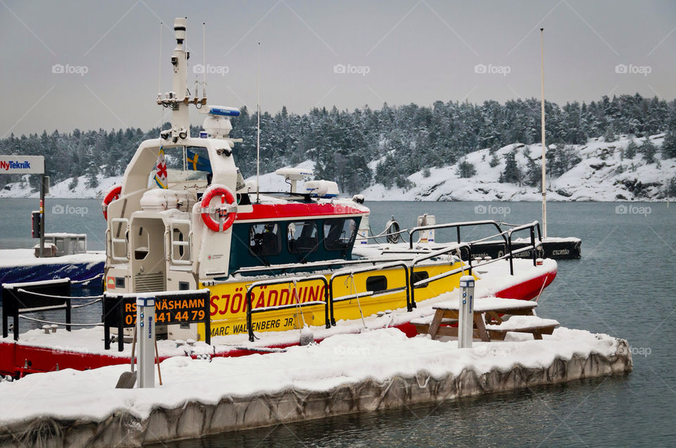 winter sweden emergency boat by sergiusz