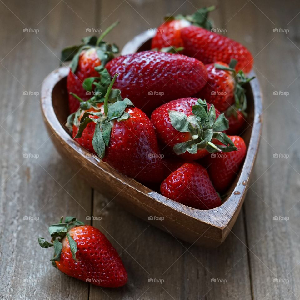 Strawberries in heart shaped bowl
