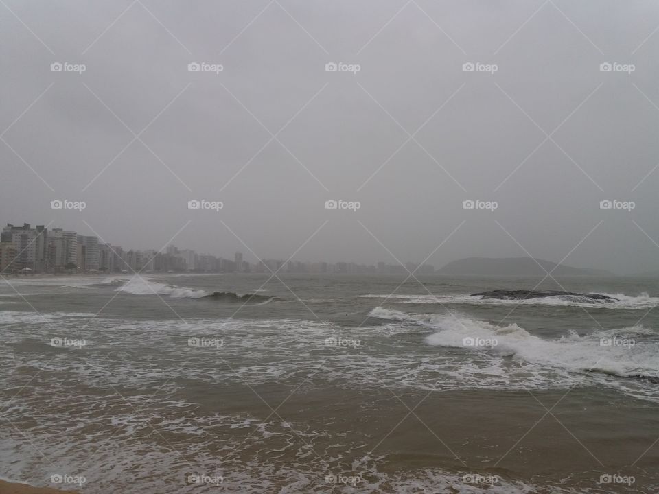 photo taken on the beach of Morro Guarapari ES Brazil on March 22, 2019 on a rainy day