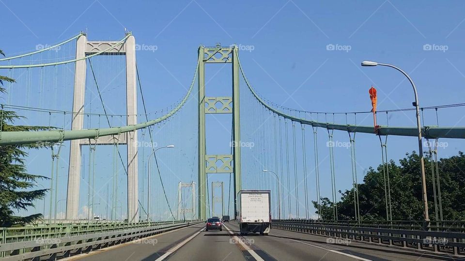 Getaway trip drive to Washington State Bridge. Beautiful bright sunny day. Clear blue sky.