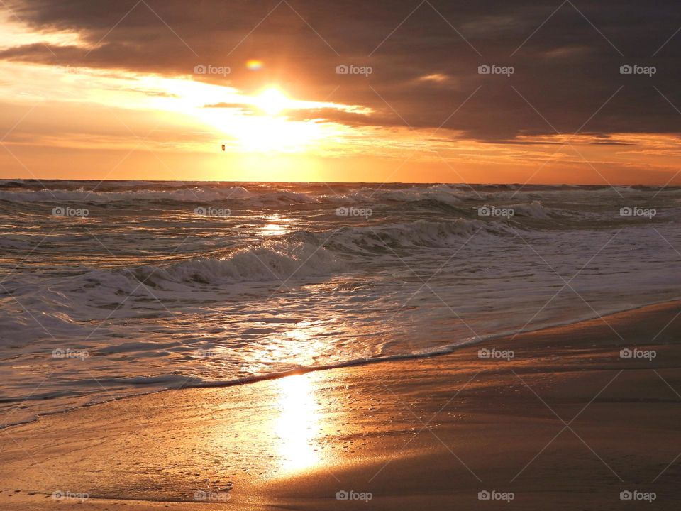 Sunset on the Gulf of Mexico - The enchanting sunset on the Gulf waters reflects through all of the capillary waves caused by the blowing winds on the surface. 