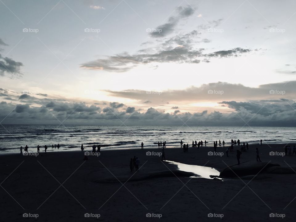 World largest sea beach the Cox’s Bazar.....sun set time... beautiful sky......... land.... water.... sky..... clouds....