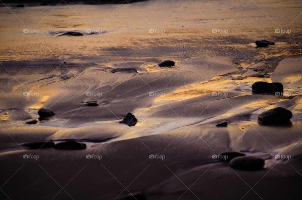 Sunset beach rocks