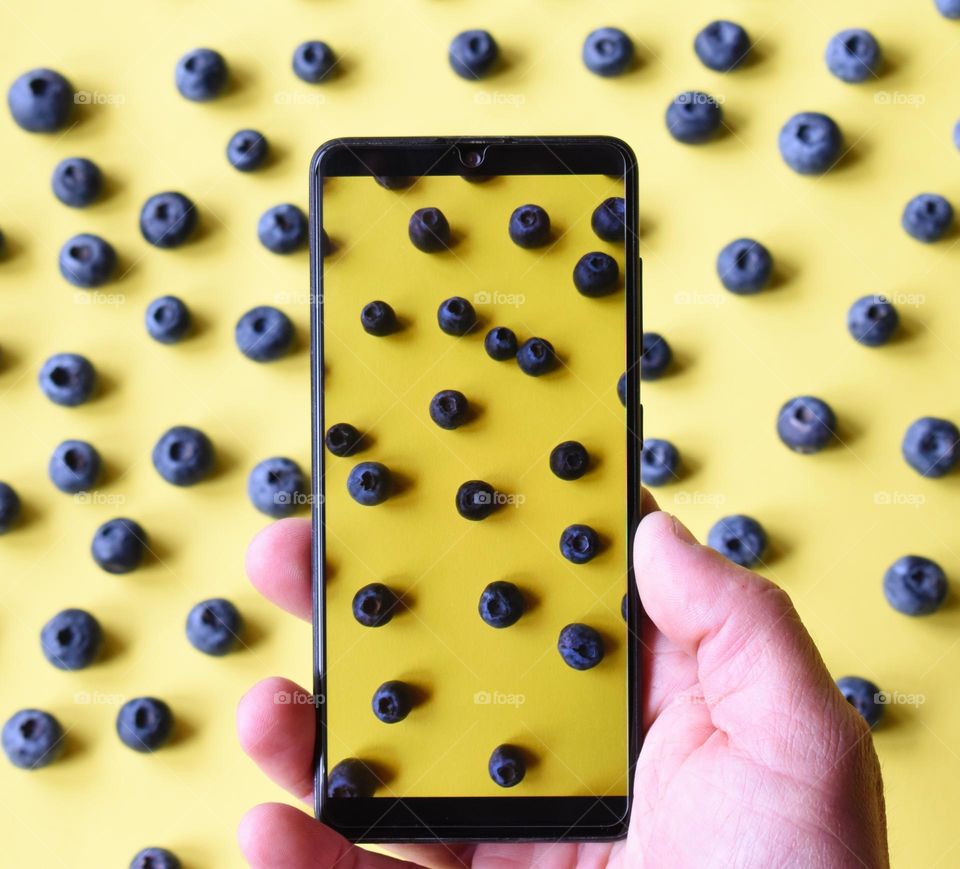 blueberry on a yellow background