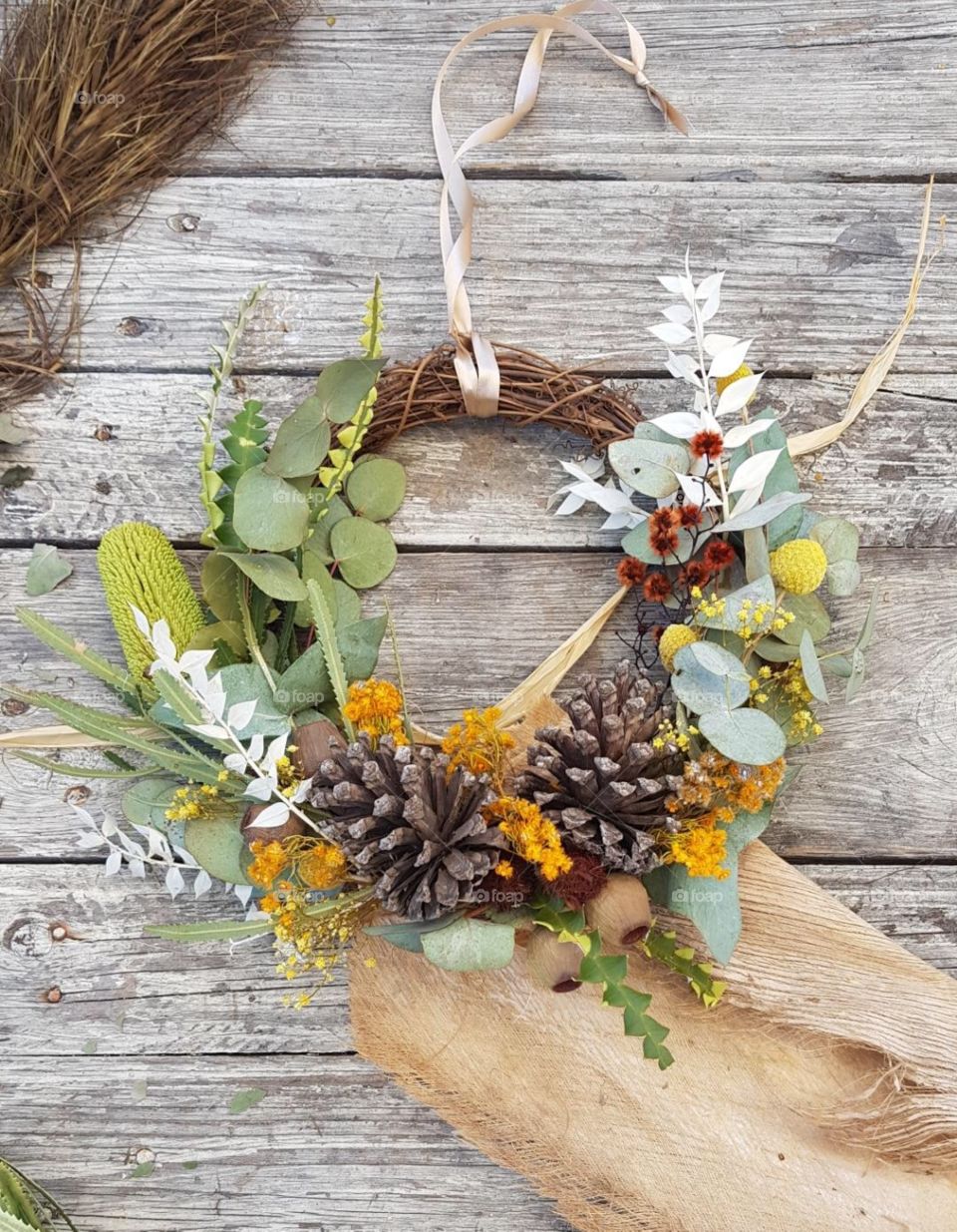 Crafty handmade wreath using Australian bative flowers, natural look, home decor.