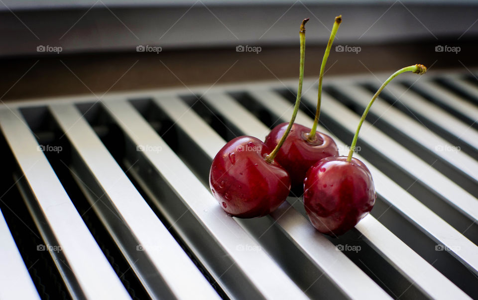 three cherries . summer berries 