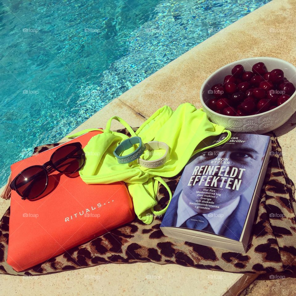 Relaxing. Relaxing by our pool with some sweets. 